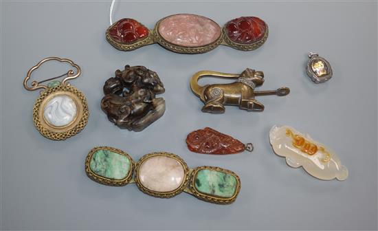 Two Chinese hardstone mounted belt buckles, other carvings and a bronze lion lock